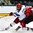 GRAND FORKS, NORTH DAKOTA - APRIL 16: Russia's Pavel Dyomin #8 scores a game winning over time goal against Switzerland's Matteo Ritz #30 during preliminary round action at the 2016 IIHF Ice Hockey U18 World Championship. (Photo by Matt Zambonin/HHOF-IIHF Images)


